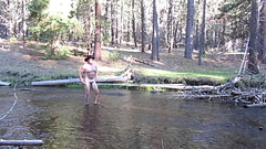 Naked bathing in the creek. Thumb