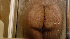 Rubbing my ass and cock on my shower window Thumb