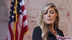 Bodyguard Ellie Lilly comforts her busty lady boss, Mayor Jamie Michelle when her husband cheated on her and everyone is talking about the scandal. Thumb