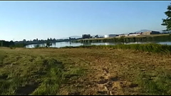walking nude at the river dike in public Thumb