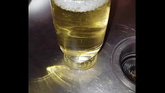 Plenty of strong yellow piss into a glass Thumb