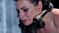 Helpless brunette in metal devices Thumb